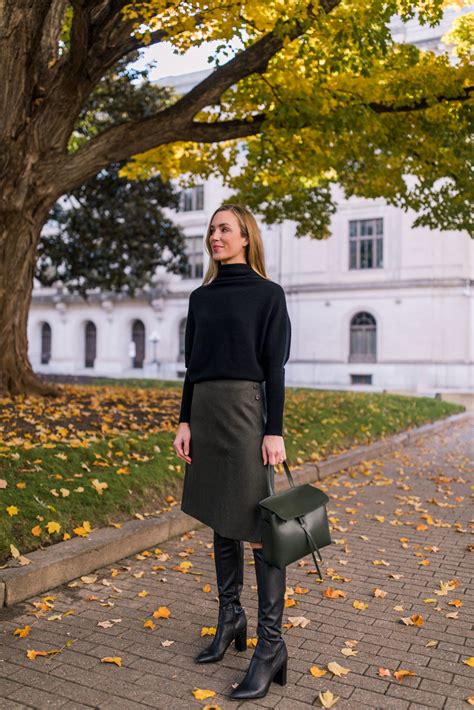 sweater with skirt and boots.